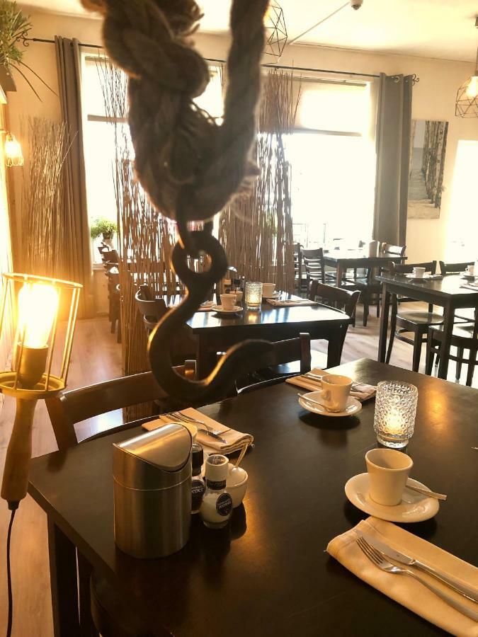 Boutique Hotel De Zwaluw 德科赫 外观 照片
